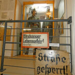 Warning sign and exhibition on air raid protection and bunker organization during the Second World War